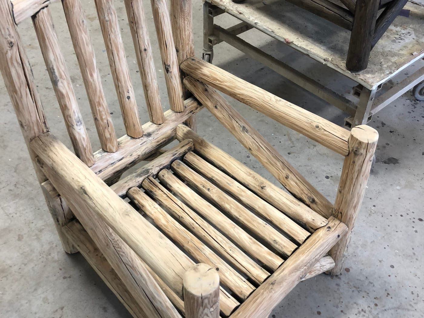 Wood chair being refinished and prepared for stain or clear coat