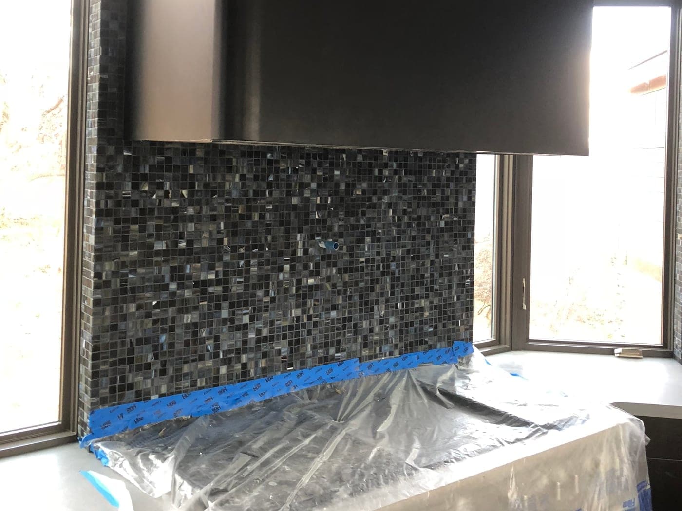 Protected interior wall and finish area prepared for texture and paint work